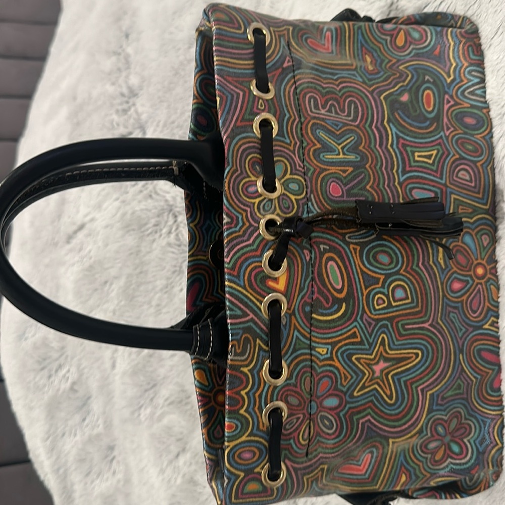 Dooney and bourke graffiti logo tassels sachet